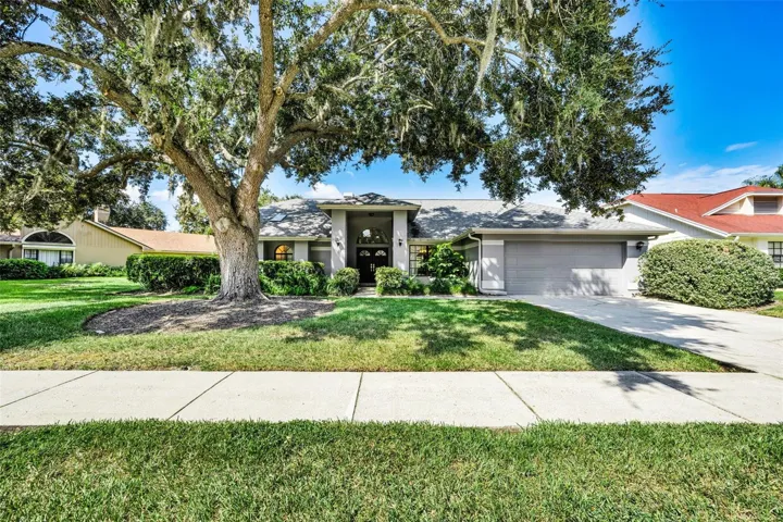 Welcome to 802 Centerwood Dr in Shadowlake, Woodfield!