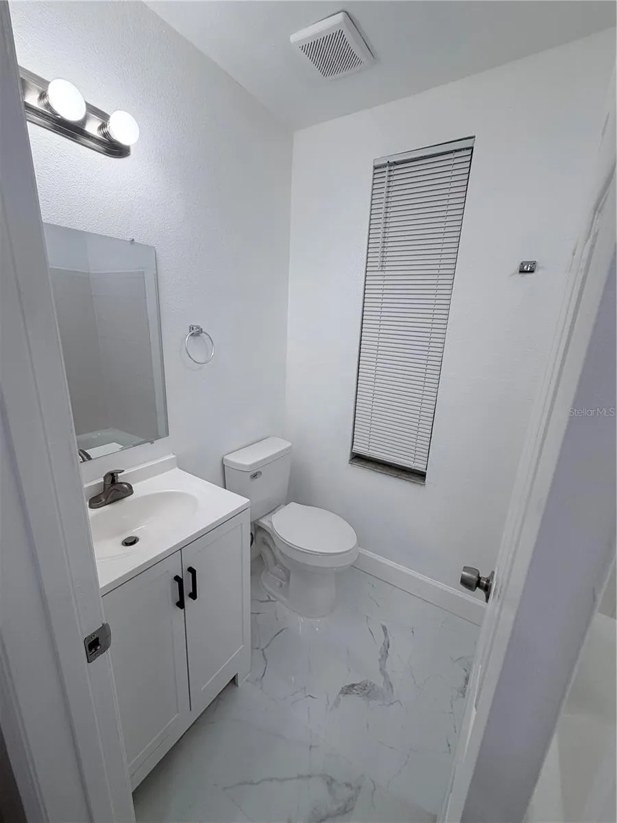 Hall bath has been updated and offers a bathtub