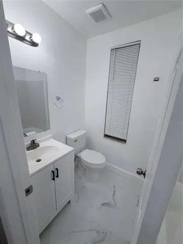 Hall bath has been updated and offers a bathtub