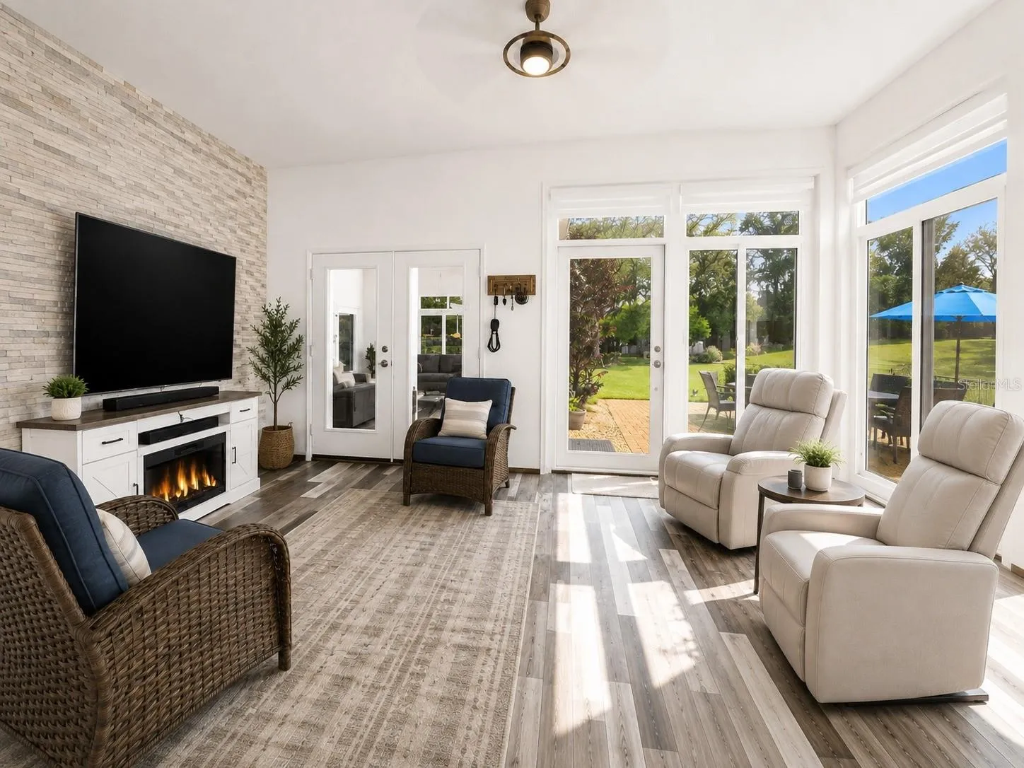 sunroom with automatic window shades