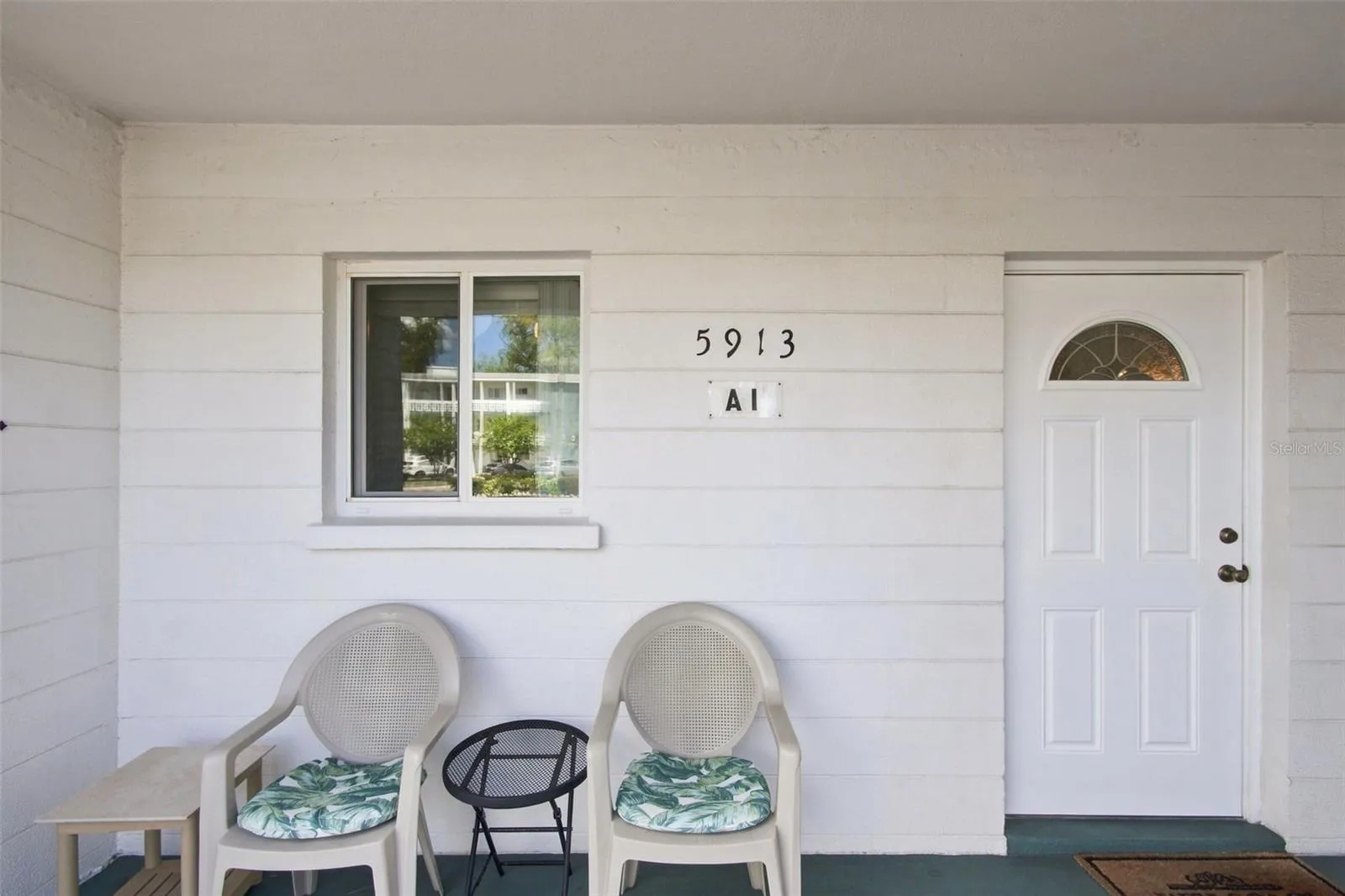 Sit with friends on the front walkway.