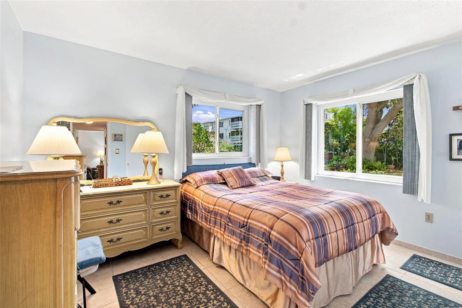 Ceramic tile floors and baseboards. Double Pane windows.