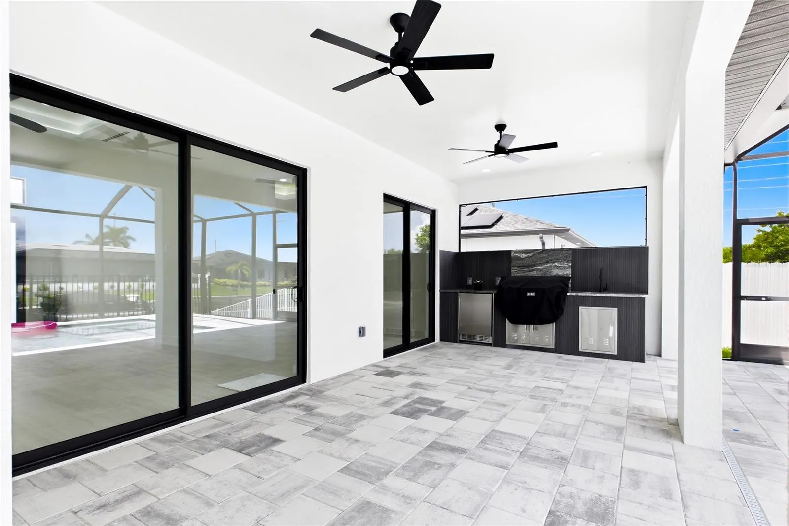 Designed for the ultimate SWFL LIFESTYLE—enjoy effortless indoor-outdoor living, poolside gatherings, waterfront views &amp; BBQs under the spacious covered lanai.
