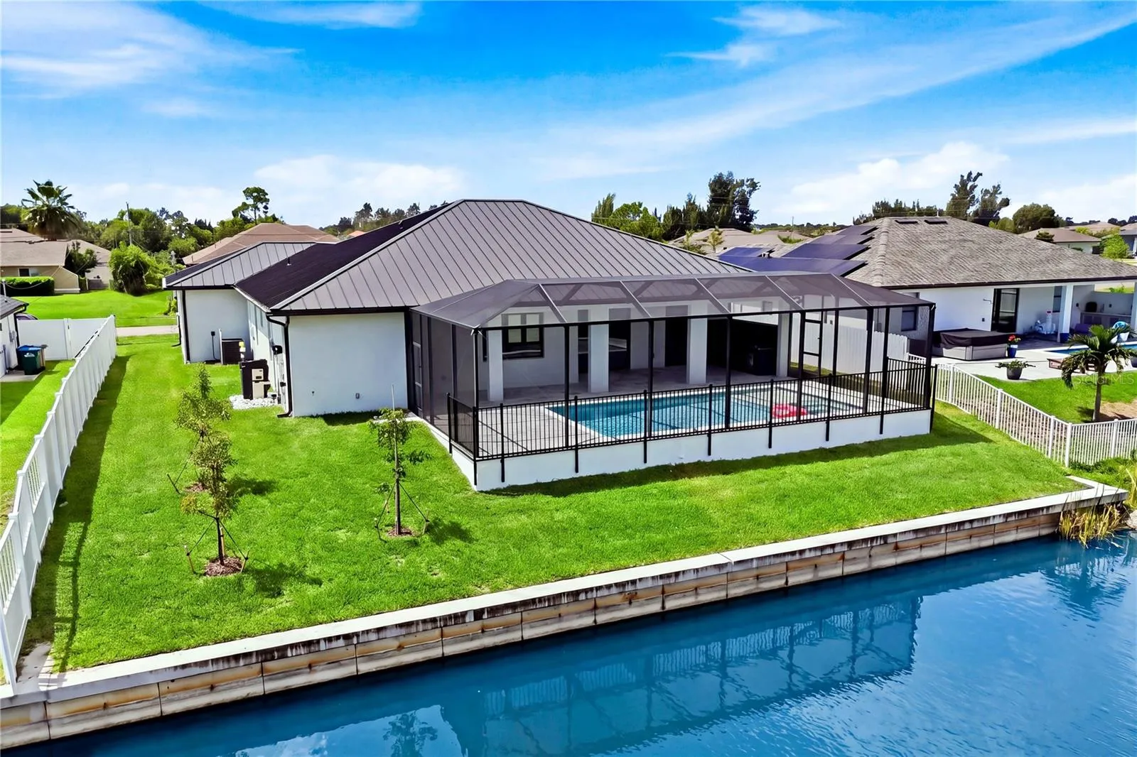 WAKE UP TO WATERFRONT VIEWS &amp; embrace the SWFL LIFESTYLE—morning coffee by the canal, afternoons kayaking or paddleboarding &amp; evenings relaxing poolside in your own backyard paradise!