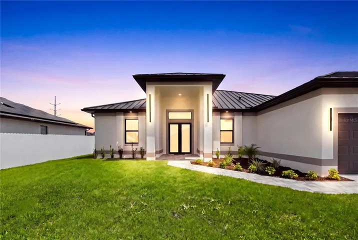 This CONTEMPORARY LUXURY HOME features SCREENED, HEATED POOL &amp; SPA &amp; 4 BEDS (2 primary suites) &amp; 3 full BATHS, layout is ideal for EVERYDAY LIVING &amp; ENTERTAINING!