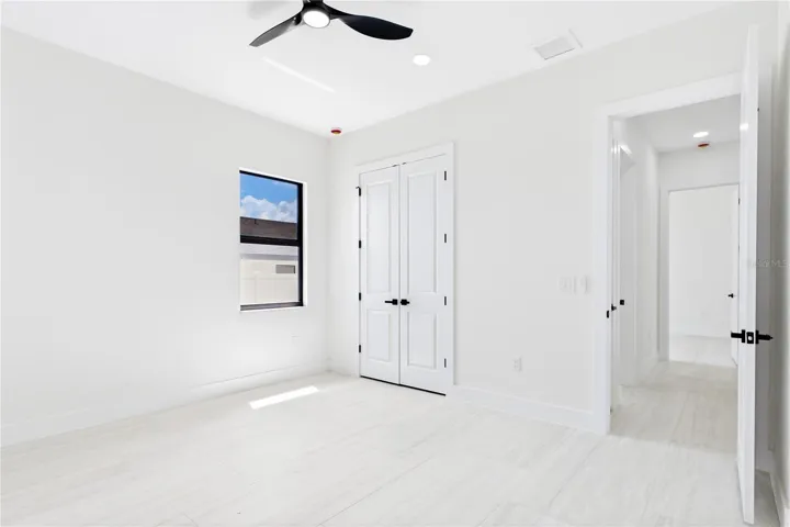 SPLIT LAYOUT w/ SECOND PRIMARY SUITE w/ POOL BATHROOM &amp; TWO GUEST BEDROOMS w/ HALL BATHROOM for added privacy.