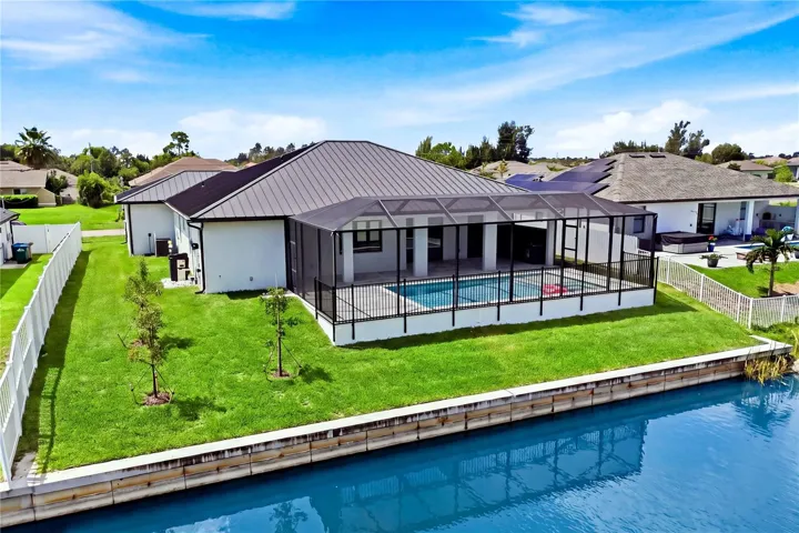WAKE UP TO WATERFRONT VIEWS &amp; embrace the SWFL LIFESTYLE—morning coffee by the canal, afternoons kayaking or paddleboarding &amp; evenings relaxing poolside in your own backyard paradise!