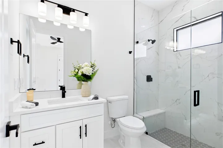 Convenient POOL BATH ACCESS makes indoor-outdoor living effortless for guests &amp; poolside days!