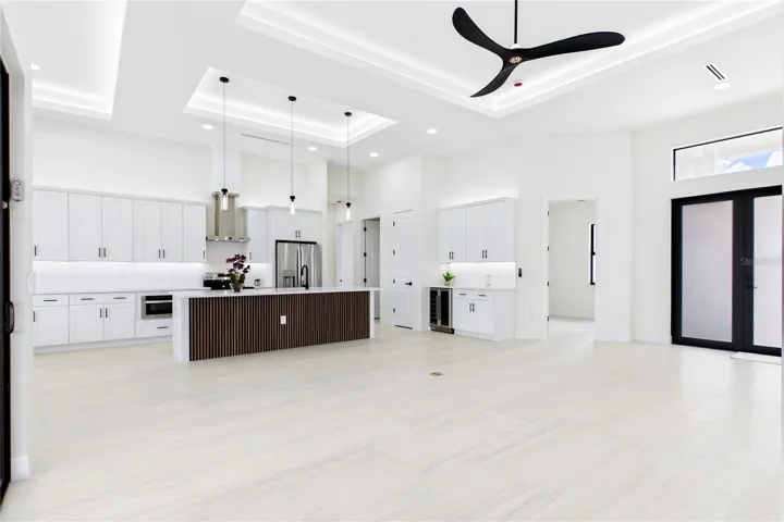 Bright, open layout w/ LIGHT NEUTRAL TILE FLOORING.