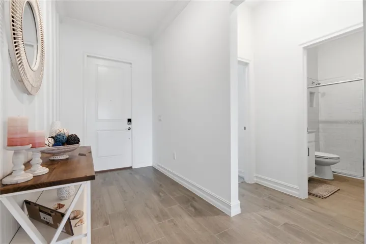 From foyer leads to bedroom and full bath