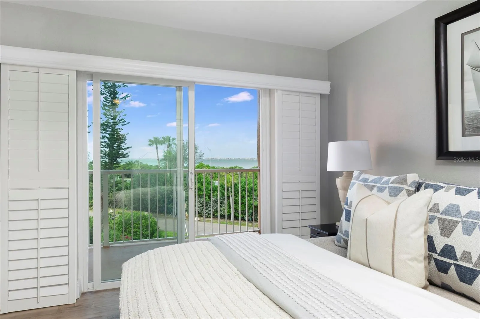 main bedroom with sliders out to your baclony