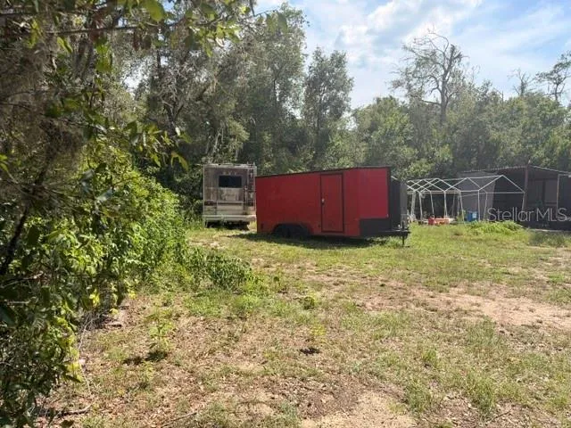 Lot on side of house