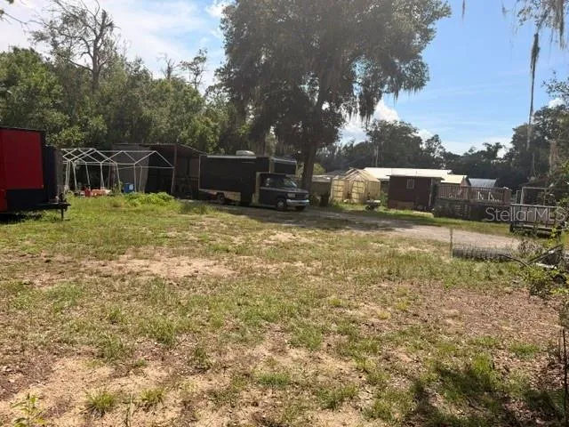 Lot on side of house