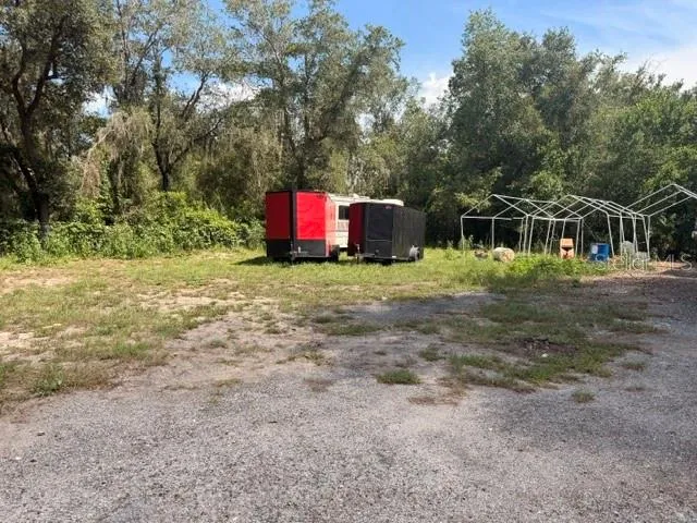 Lot on side of house