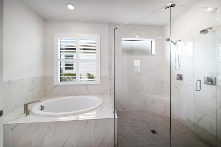 Primary Bathroom Soaking Tub and Large Shower