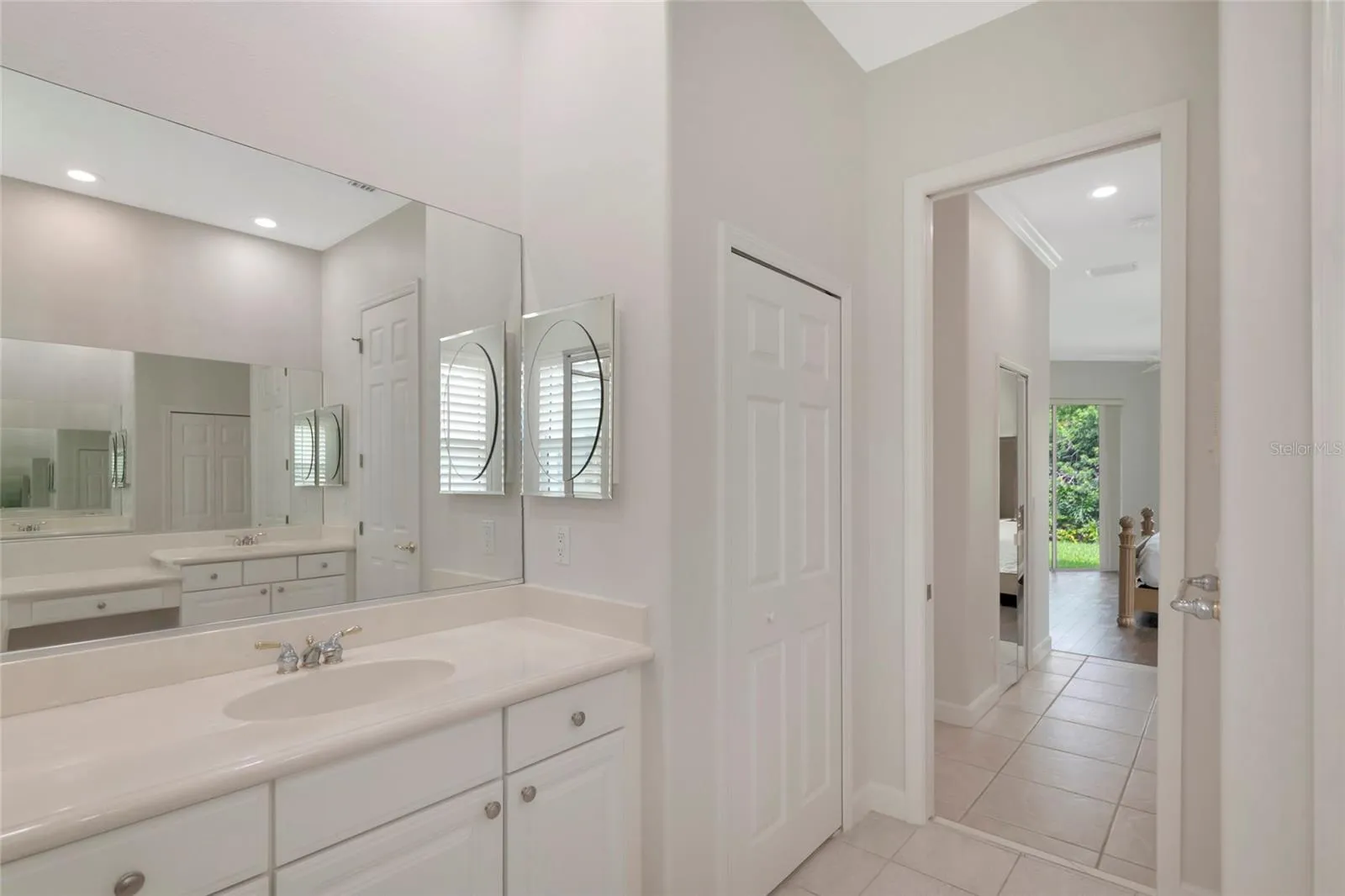 Primary bath 2nd sink and linen closet.
