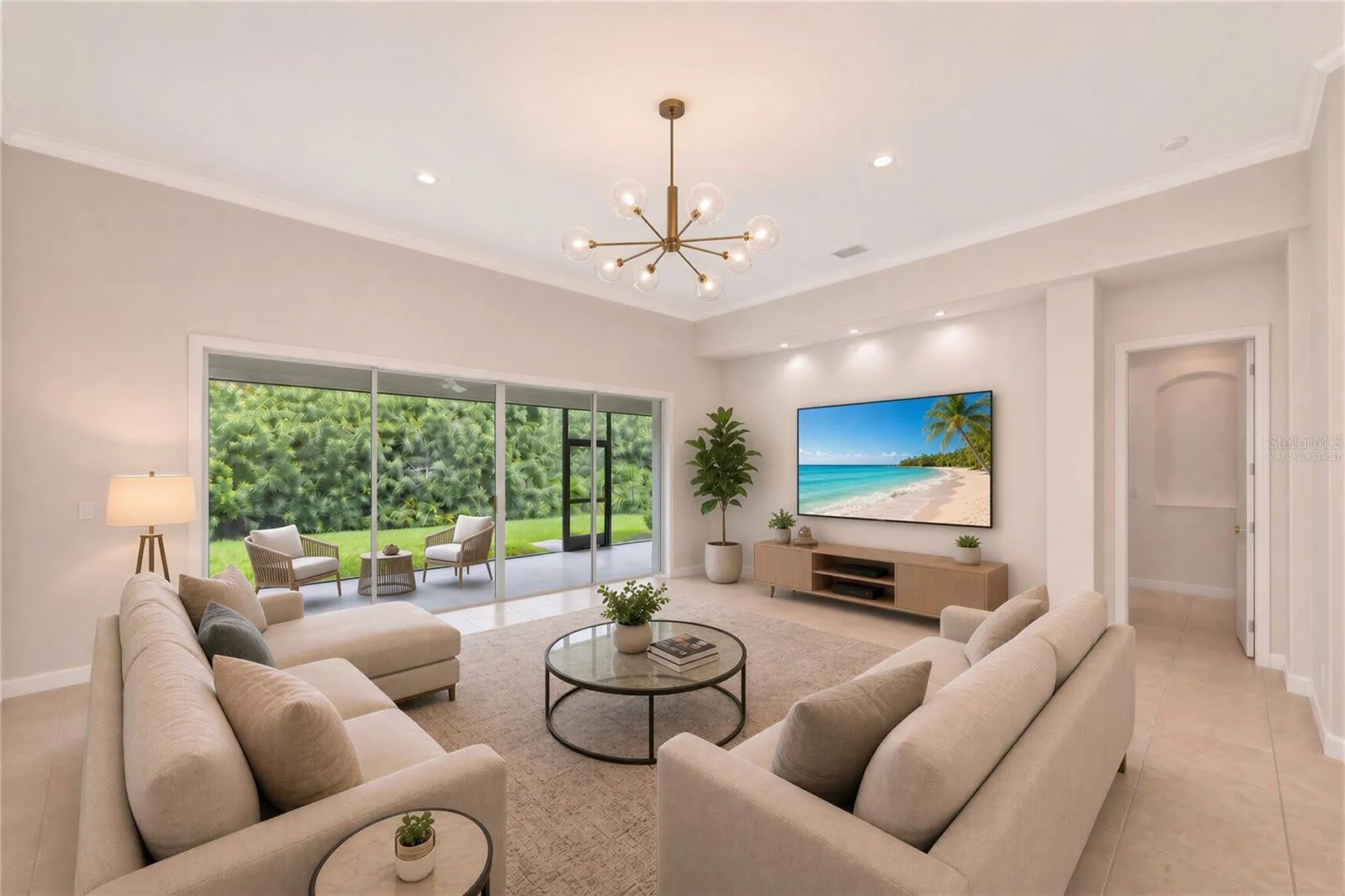 Virtually staged great room w/ 12' ceilings & crown molding, new panoramic screened lanai.