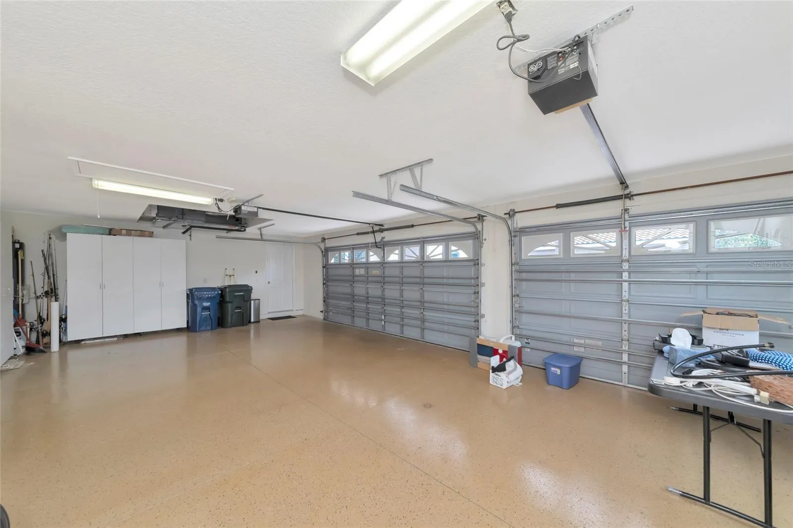 3-car garage, epoxy garage floor, AC 2025.