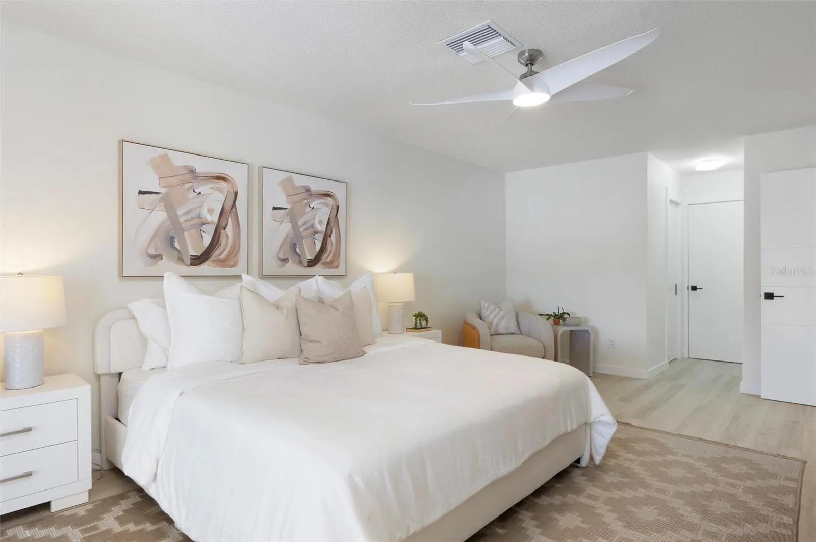 Perfect Place to relax, sitting area, primary suite includes bathroom & walk-in closet by Closets by Design