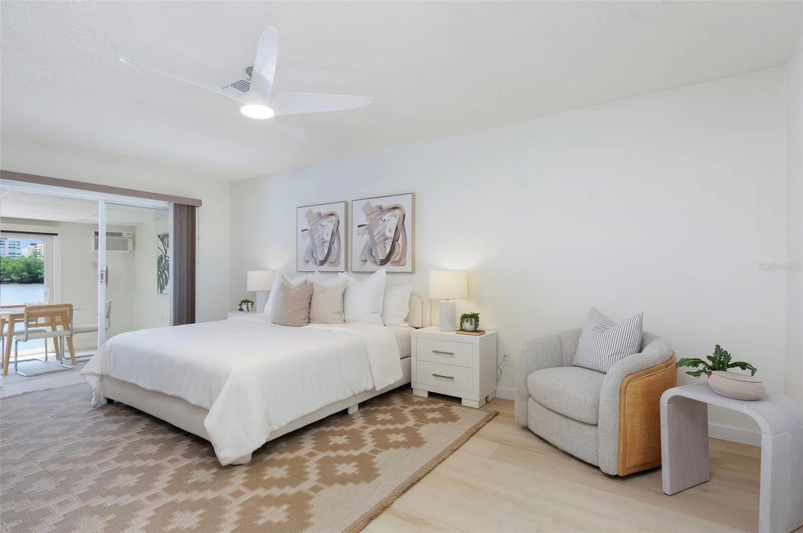 Primary Suite awaits! Opens to the Flex FLorida Room