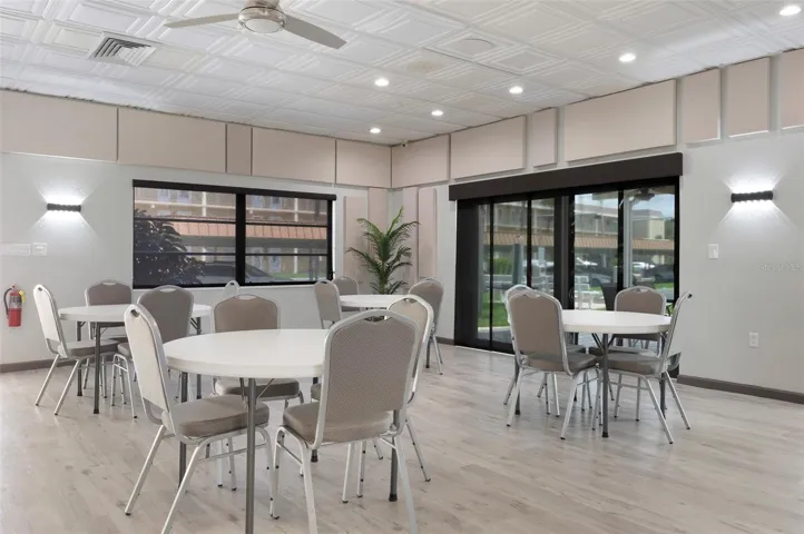 2nd Clubhouse set up for your games: Bridge, Mahjong, or just to socialize! Also, the outside patio area.