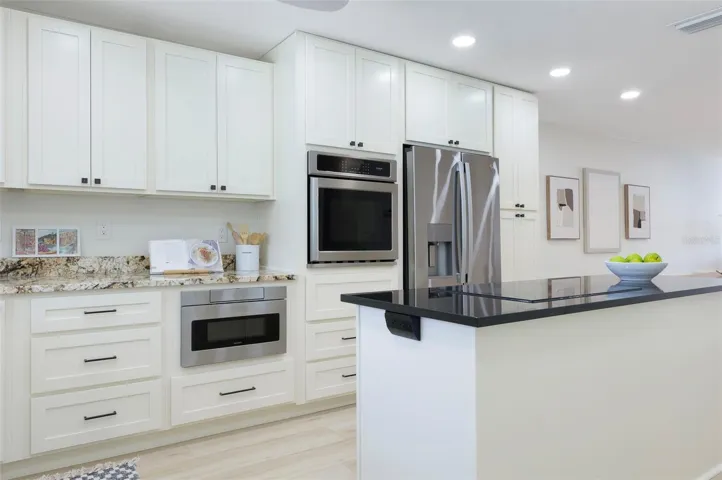 Perfect place to cook and entertain. The window over the Kitchen Sink brings in light.