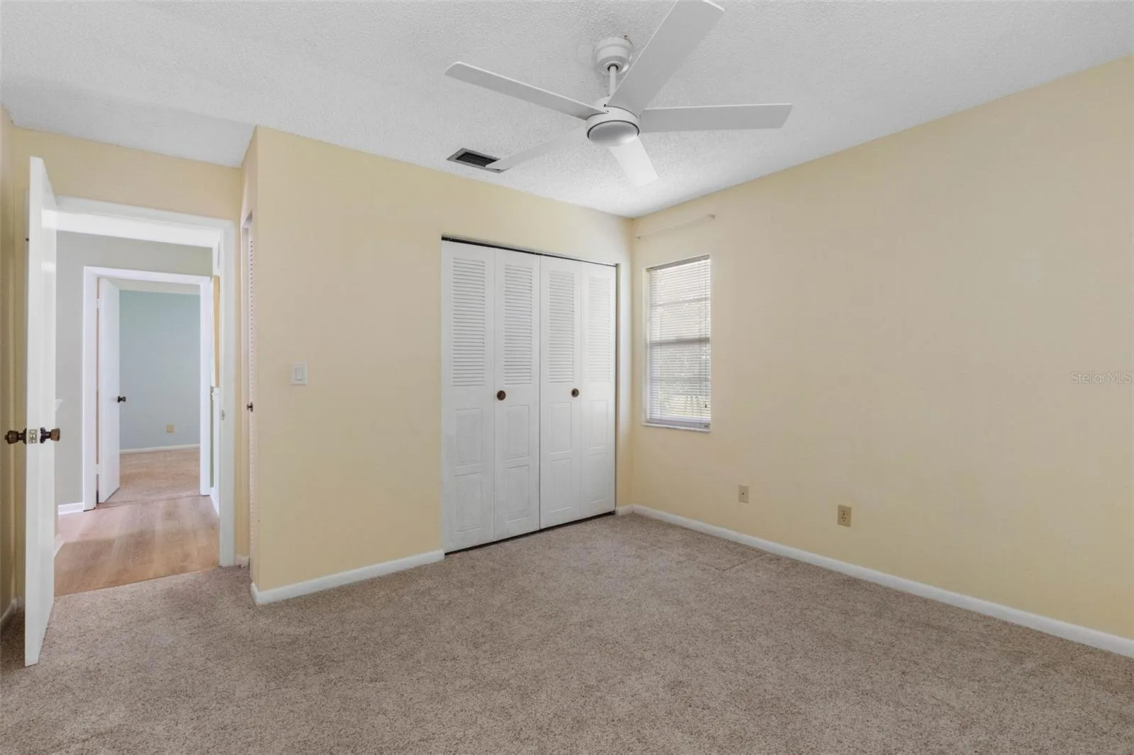 Bedroom 2, with new ceiling fan