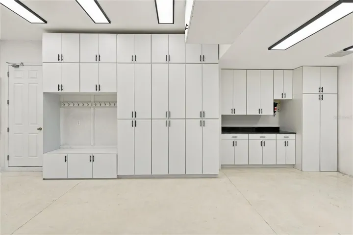 Garage with built-in cabinets