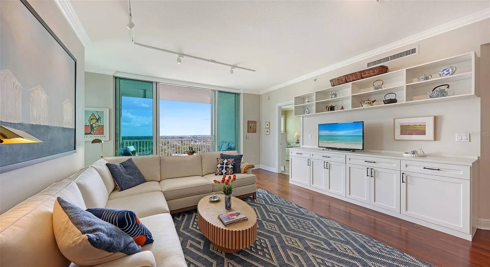 Living Room with Ceiling Height Wall of Sliders