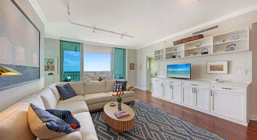 Living Room with Ceiling Height Wall of Sliders