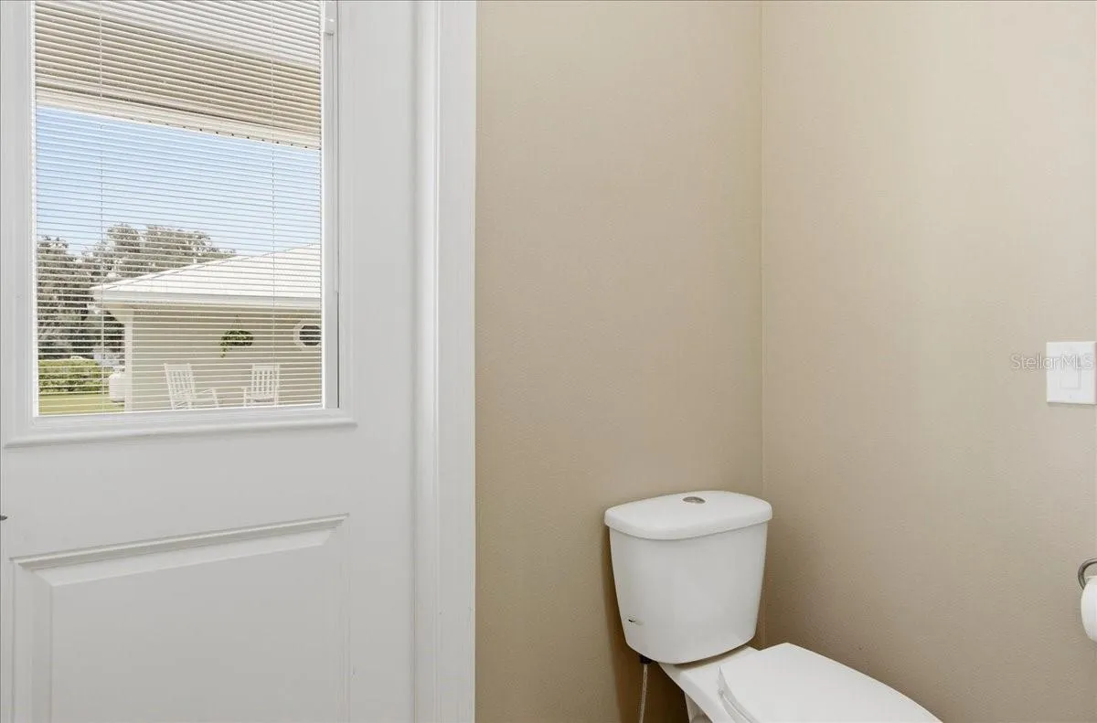 Side Door to outside Pool Area and restroom