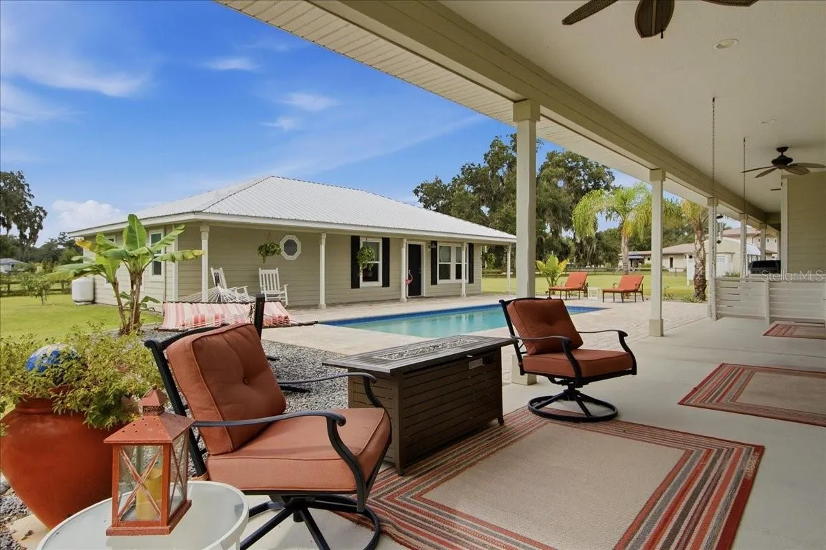 Covered Patio Sitting Area with gas Fire Pit