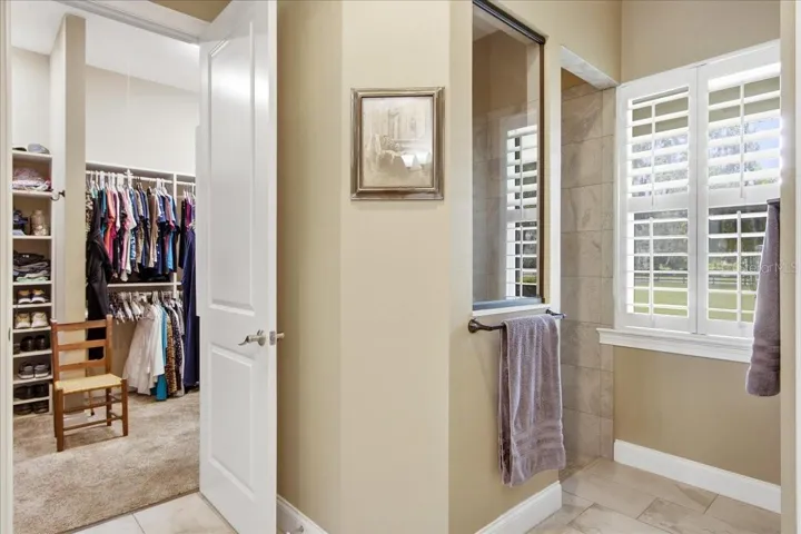 View from Primary Bath to Walk-In Closet &amp; shower