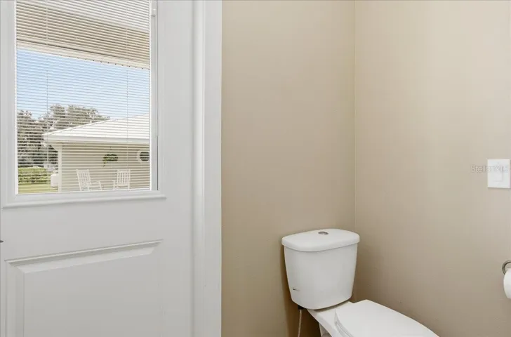 Side Door to outside Pool Area and restroom