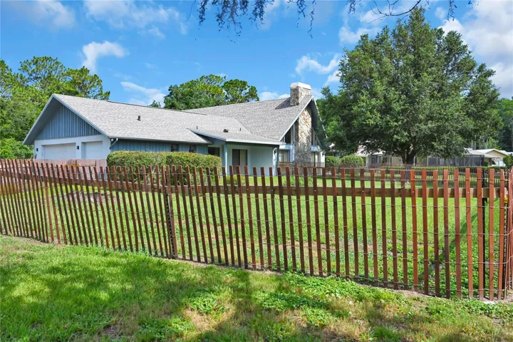 temp fence and back of House