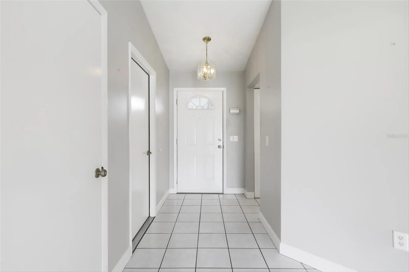 Front door entrance garage to the left.  kitchen to the right.