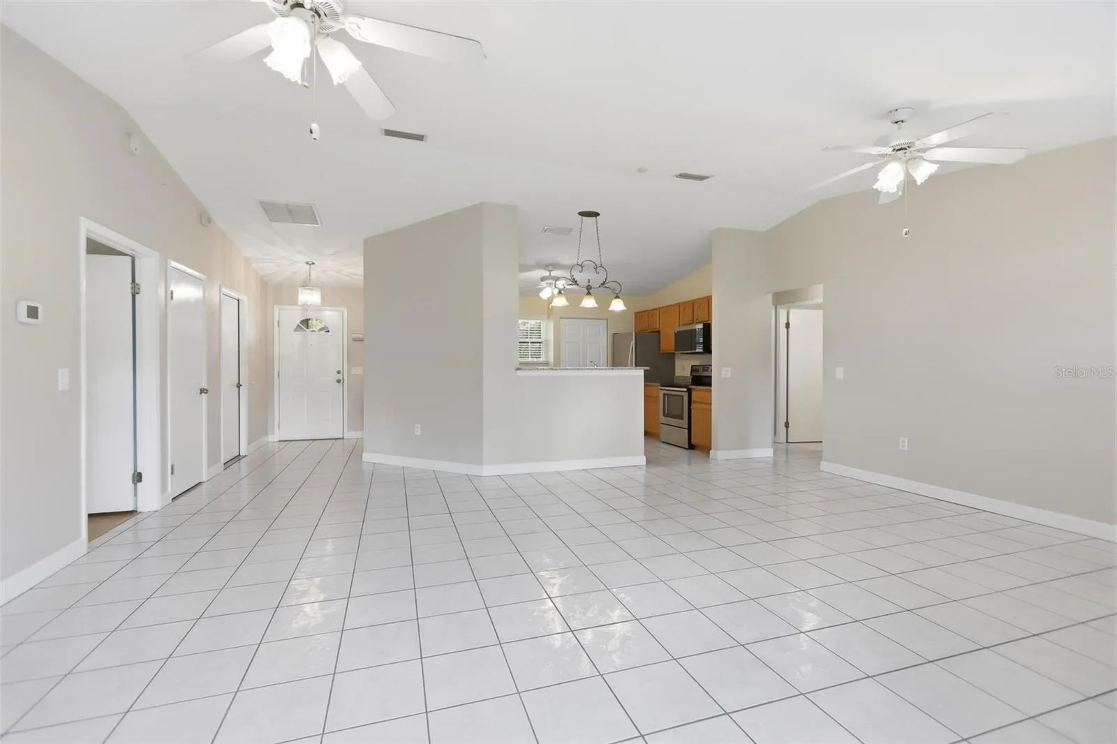 Great room facing the kitchen from the padio door