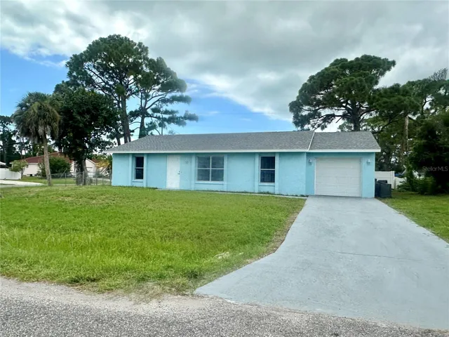 Exterior front , corner lot home.