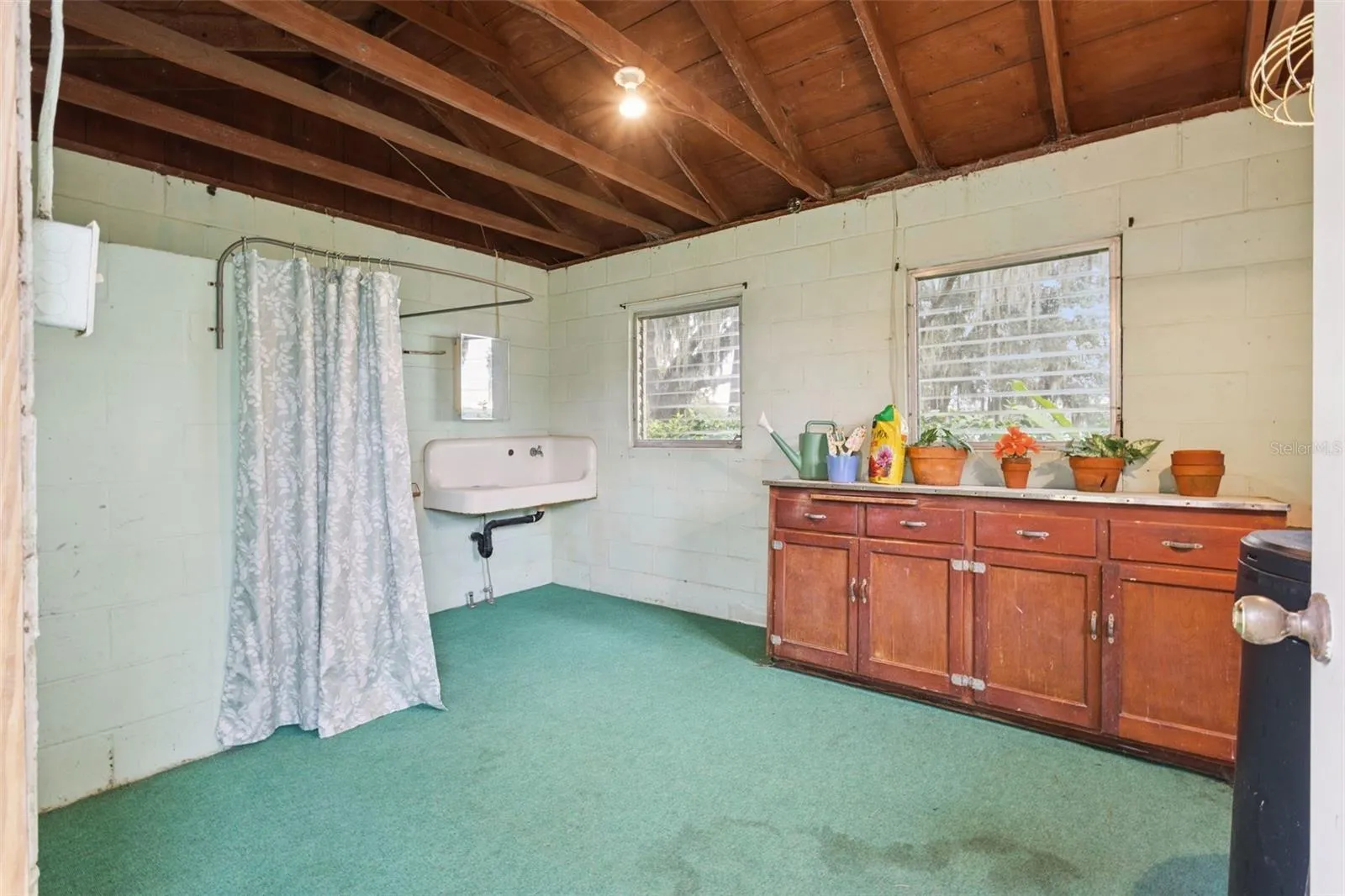Outhouse with power, water, toilet & shower