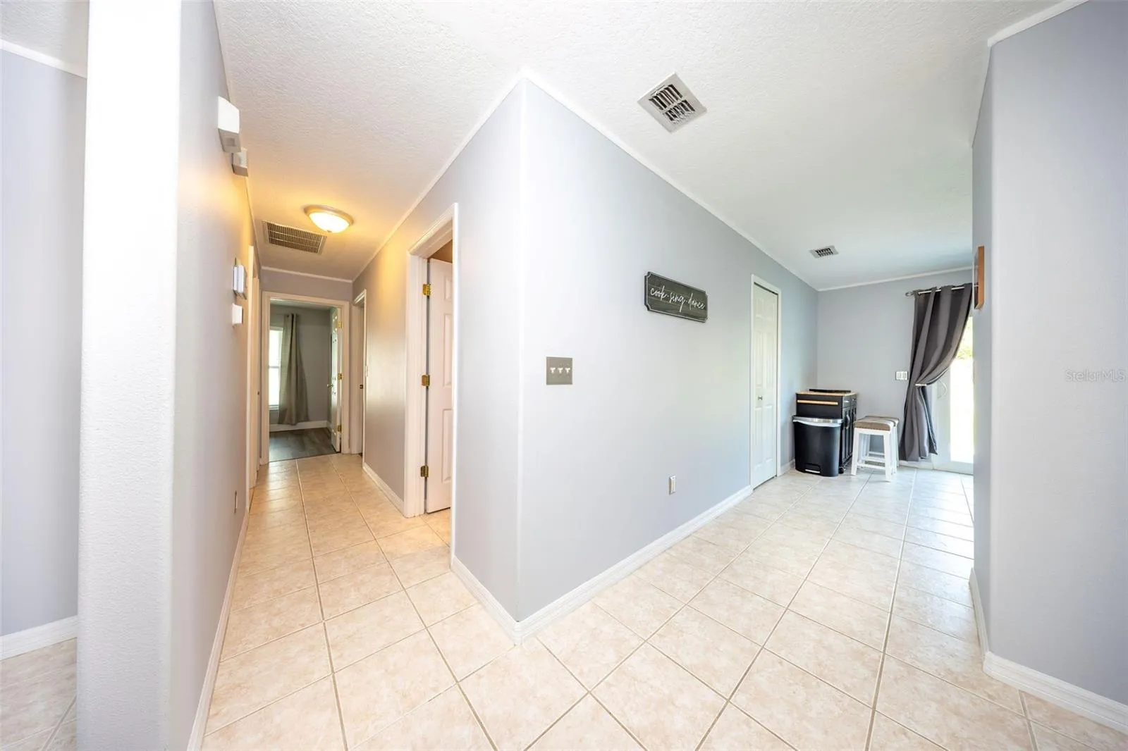 Hallway to bedroom 2 and primary bedroom