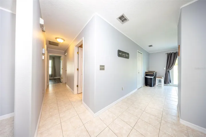 Hallway to bedroom 2 and primary bedroom