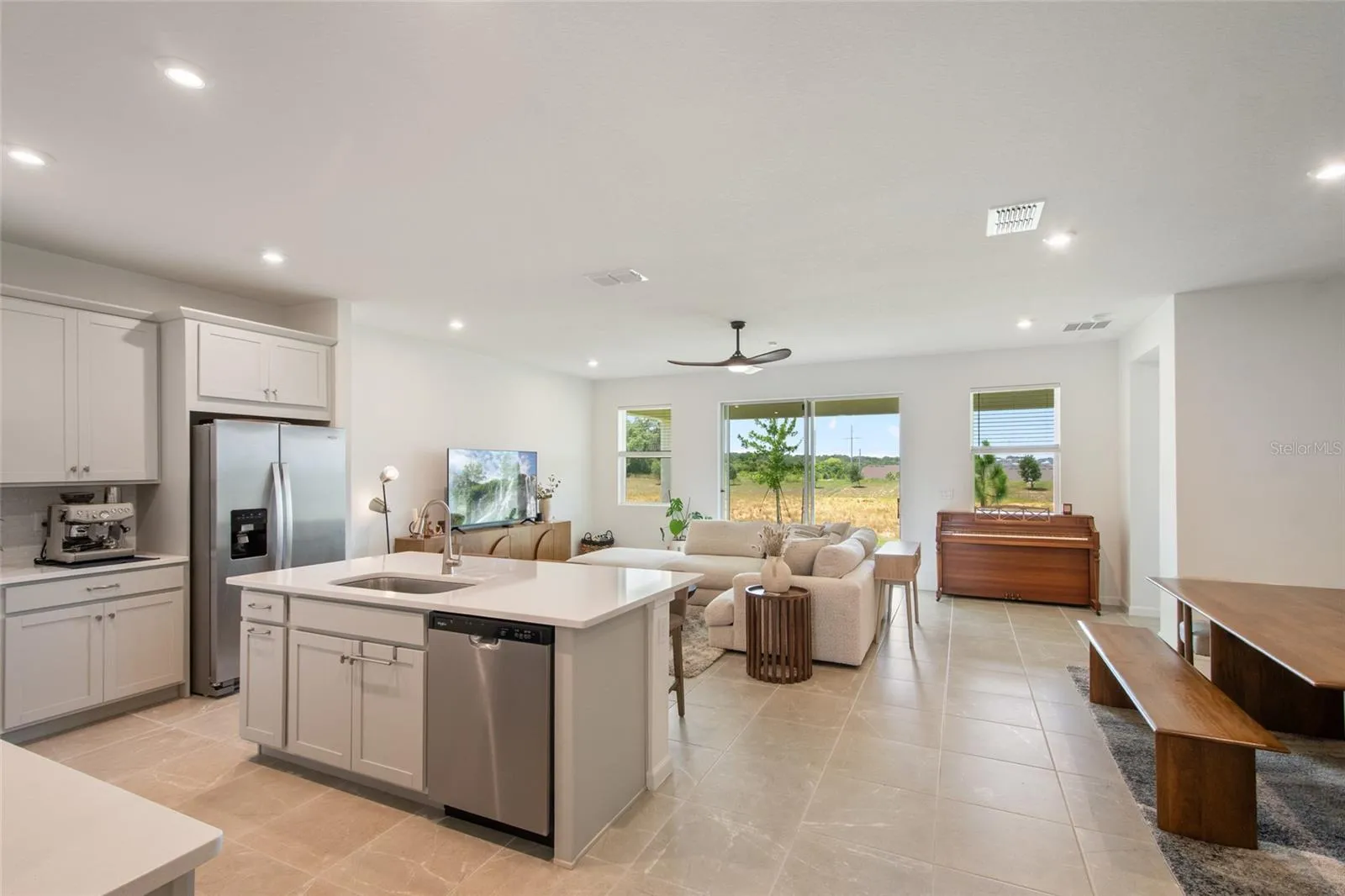 Beautiful unobstructed view of the rear common space that is maintained by the HOA.