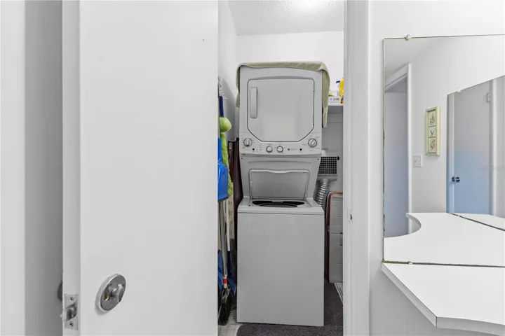 Closet with stack washer & dryer