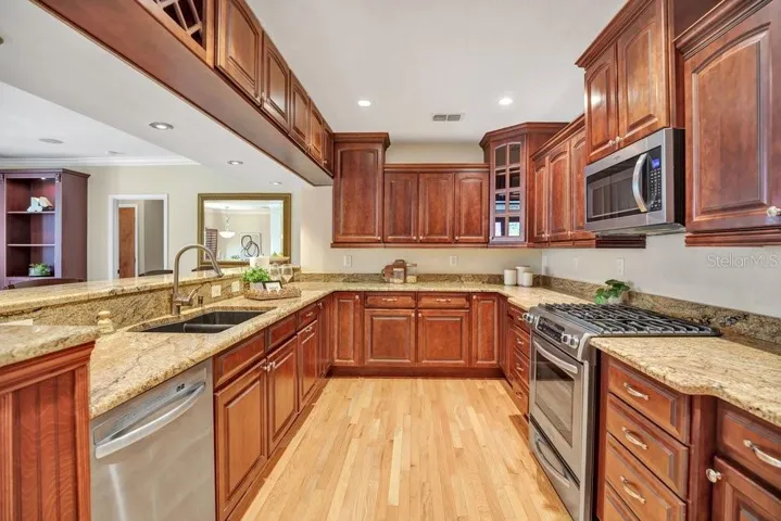Open Kitchen, granite counters, solid wood cabinetry
