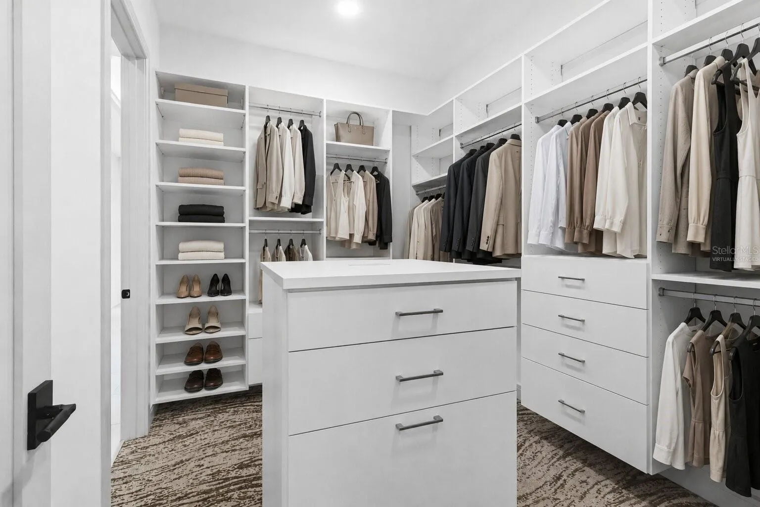 Virtually Staged Image of custom walk-in closet