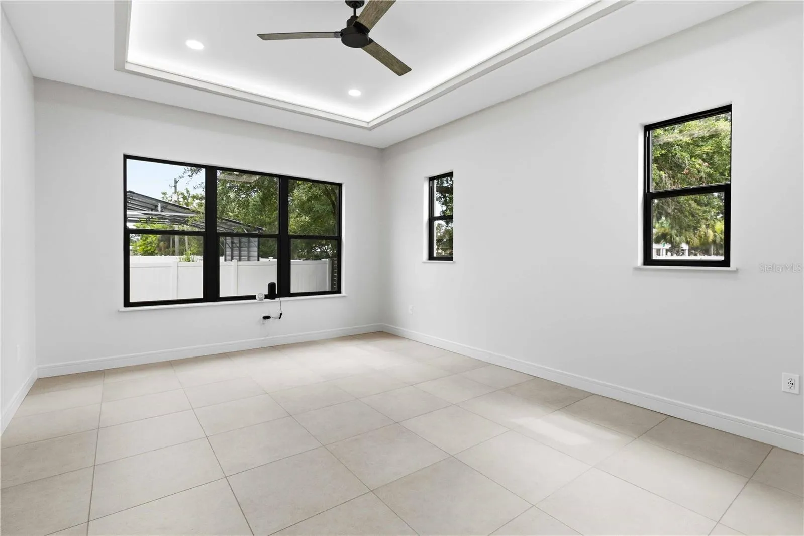 Privately positioned in its own wing, the spacious primary suite provides a tranquil escape with an impressive walk-in closet and a spa-inspired bathroom