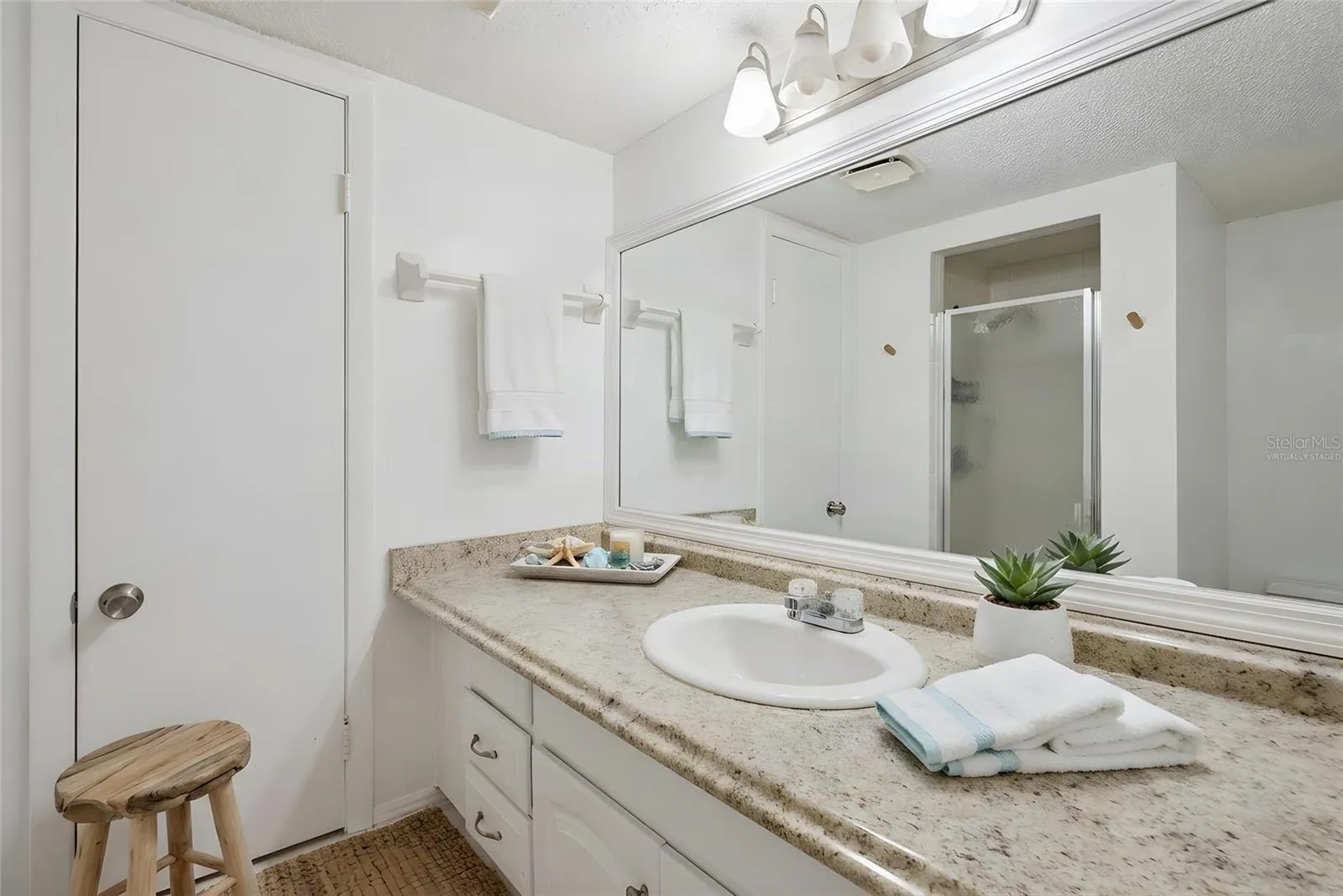 Virtually staged primary bathroom