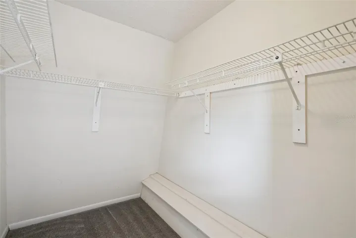 Walk-In Closet in Primary Bedroom