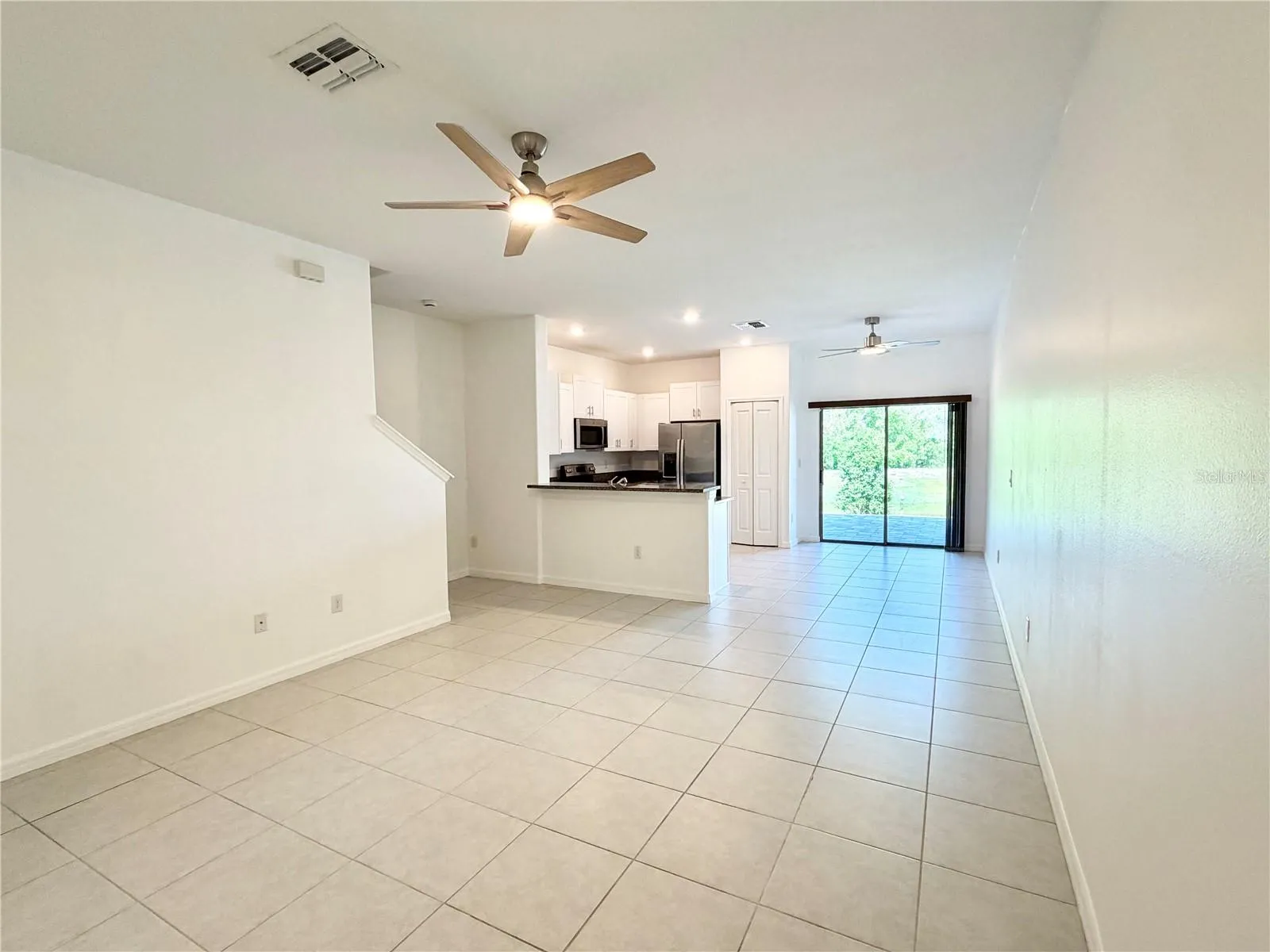 Living room, open to dining room and kitchen
