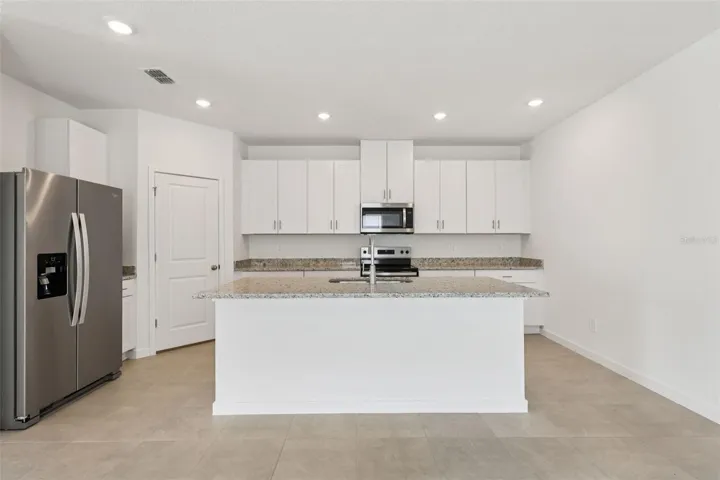 Photos are not of the actual home, but are photos of the builder home with same floorplan